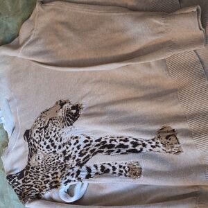 Time and tru sweater leopard print front and back! Really cute paired w jeans.